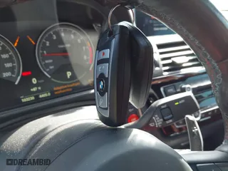 2019 BMW M4 with VIN WBS4Y9C5XKAG67446, listed as a IAAI auction lot 41669865 with 103,230 mi miles. Bid and sale history available at carsss.com. Image 11.