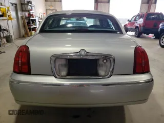 2002 Lincoln Town Car Executive z VIN 1LNHM81W32Y628546, wystawiony jako Copart lot #54248775 z przebiegiem 188 496 mil mil oraz Czysty tytuł • Clean title. Historia ofert i sprzedaży dostępna na DreamBid. Obrazek 6.