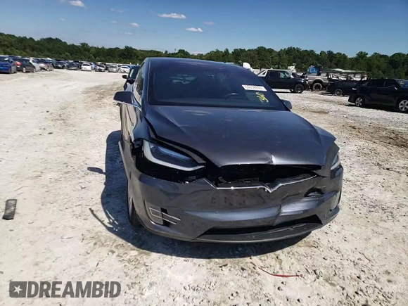 2017 Tesla Model X 90D z VIN 5YJXCDE23HF051027, wystawiony jako Copart lot #64608843 z przebiegiem 77 222 mil mil oraz Szkody całkowita. Historia ofert i sprzedaży dostępna na DreamBid. Obrazek 12.
