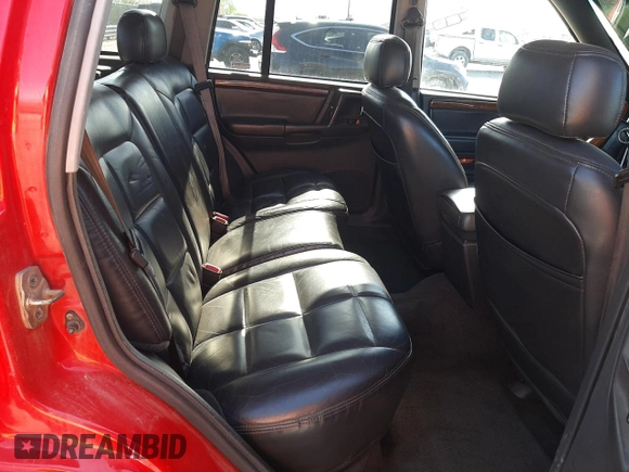1996 Jeep Grand Cherokee Limited with VIN 1J4GZ78Y0TC376265, listed as a Copart auction lot 52124345 with 205,676 mi miles and Salvage Title. Bid and sale history available at carsss.com. Image 10.