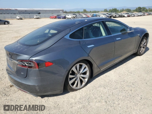 2014 Tesla Model S 60 с VIN 5YJSA1H15EFP49412, выставлен на аукционе Copart как лот 60476835 с пробегом 96 202 миль миль и Списание • Salvage title. История ставок и продаж доступна на DreamBid. Изображение 3.