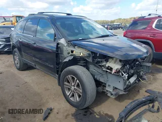 2016 Chevrolet Traverse LT with VIN 1GNKRGKD8GJ272203, listed as a IAAI auction lot 40770710 with 163,252 mi miles. Bid and sale history available at carsss.com. Image 1.