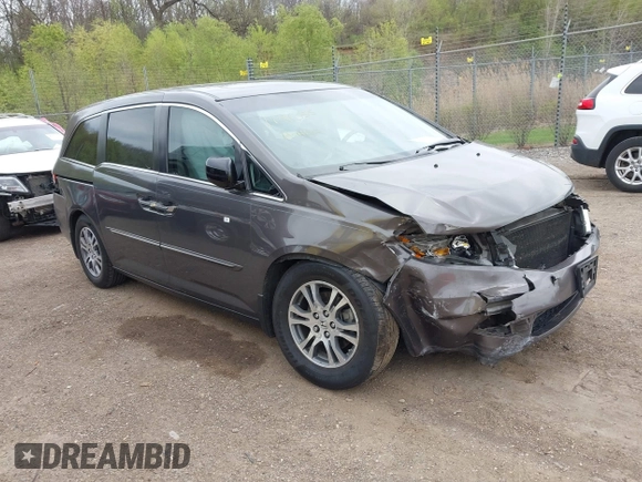 2011 Honda Odyssey EX-L with VIN 5FNRL5H68BB100274, listed as a IAAI auction lot 42159787 with 205,616 mi miles and . Bid and sale history available at carsss.com. Image 1.