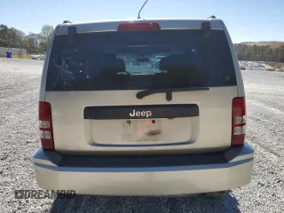 2010 Jeep Liberty Sport with VIN 1J4PP2GK9AW128825, listed as a Copart auction lot 48113835 with 258,730 mi miles and Salvage Title. Bid and sale history available at DreamBid. Image 6.