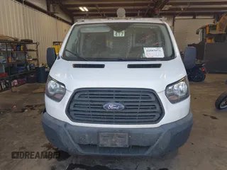 2018 Ford Transit with VIN 1FTYE1YM5JKA32059, listed as a IAAI auction lot 42583971 with 196,244 mi miles and . Bid and sale history available at DreamBid. Image 12.