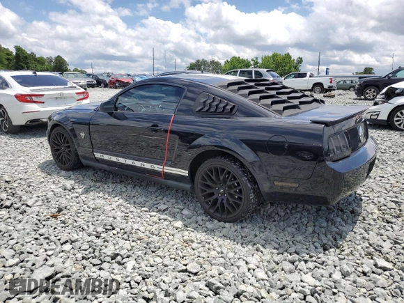2009 Ford Mustang z VIN 1ZVHT80N295128967, wystawiony jako Copart lot #59182115 z przebiegiem 91 119 mil mil oraz Szkoda całkowita • Salvage title. Historia ofert i sprzedaży dostępna na DreamBid. Obrazek 2.