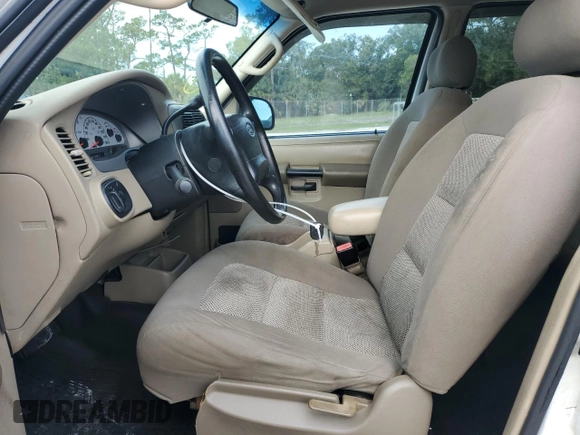 2004 Ford Explorer Sport Trac XLS with VIN 1FMZU67K24UC13080, listed as a Copart auction lot 57996855 with 140,707 mi miles and Non repairable. Bid and sale history available at DreamBid. Image 7.