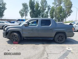2007 Honda Ridgeline RTL with VIN 2HJYK16547H502601, listed as a IAAI auction lot 42484634 with 197,253 mi miles and . Bid and sale history available at DreamBid. Image 14.