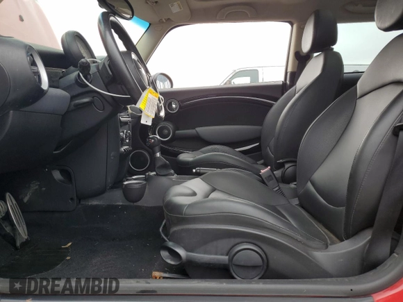 2012 MINI Hardtop S with VIN WMWSV3C59CT385254, listed as a Copart auction lot 52675675 with 76,250 mi miles and Salvage Title. Bid and sale history available at DreamBid. Image 7.