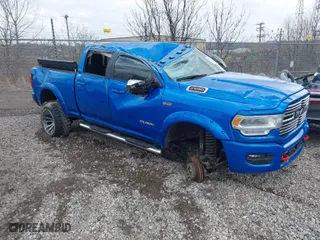 2022 Ram 2500 Laramie with VIN 3C6UR5FJ7NG159600, listed as a IAAI auction lot 41679214 with 36,473 mi miles. Bid and sale history available at carsss.com. Image 1.