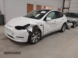 2022 Tesla Model Y Long Range z VIN 7SAYGDEE3NF358487, wystawiony jako IAAI lot #42036969 z przebiegiem 52 723 mil mil oraz . Historia ofert i sprzedaży dostępna na DreamBid. Obrazek 19.