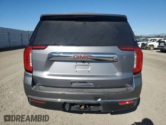 2022 GMC Yukon SLT with VIN 1GKS2BKD0NR115087, listed as a Copart auction lot 64805714 with 43,977 mi miles and Salvage Title. Bid and sale history available at carsss.com. Image 6.