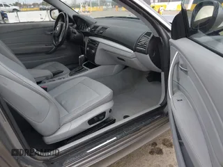 2010 BMW 1 Series 128i with VIN WBAUP9C52AVL89282, listed as a IAAI auction lot 41787668 with 152,976 mi miles and . Bid and sale history available at DreamBid. Image 5.