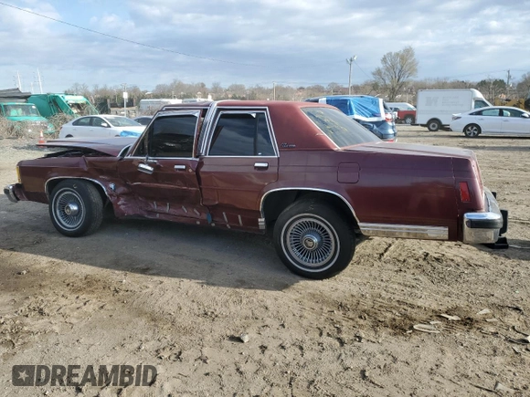 1987 Ford Ltd Crown Victoria with VIN 2FABP73F8HX128759, listed as a Copart auction lot 49956845 with 0 mi miles and Salvage Title. Bid and sale history available at carsss.com. Image 2.