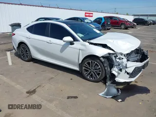 2025 Toyota Camry LE с VIN 4T1DBADKXSU519464, выставлен на аукционе IAAI как лот 42119180 с пробегом 6 949 миль миль и . История ставок и продаж доступна на DreamBid. Изображение 1.