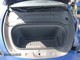 2023 Tesla Model Y Long Range with VIN 7SAYGDEE7PF702051, listed as a IAAI auction lot 42074182 with 50,473 mi miles and . Bid and sale history available at DreamBid. Image 10.