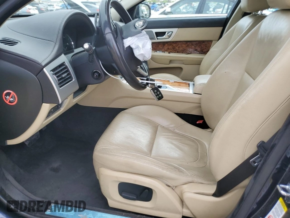 2014 Jaguar XF SC with VIN SAJWA0EX3E8U17748, listed as a Copart auction lot 52010435 with 84,685 mi miles and Salvage Title. Bid and sale history available at DreamBid. Image 7.
