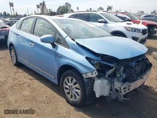 2014 Toyota Prius Plug-In with VIN JTDKN3DPXE3059243, listed as a IAAI auction lot 40522142 with 1 mi miles. Bid and sale history available at carsss.com. Image 1.