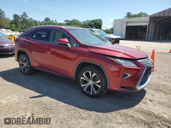 2016 Lexus RX 350 with VIN 2T2ZZMCA3GC005696, listed as a Copart auction lot 56166385 with 111,975 mi miles and Salvage title. Bid and sale history available at DreamBid. Image 4.