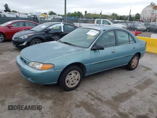 1997 Ford Escort LX z VIN 1FALP13P2VW120285, wystawiony jako IAAI lot #42062142 z przebiegiem 199 076 mil mil oraz . Historia ofert i sprzedaży dostępna na DreamBid. Obrazek 2.