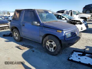 1998 Chevrolet Tracker z VIN 2CNBJ1863W6906496, wystawiony jako Copart lot #87368314 z przebiegiem 144 557 mil mil oraz Czysty tytuł • Clean title. Historia ofert i sprzedaży dostępna na DreamBid. Obrazek 5.