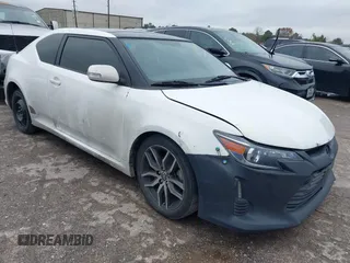 2014 Scion tC with VIN JTKJF5C73E3074035, listed as a IAAI auction lot 41426238 with 116,469 mi miles. Bid and sale history available at carsss.com. Image 1.