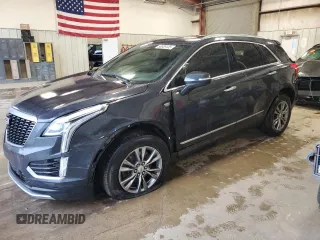 2021 Cadillac XT5 FWD Premium Luxury with VIN 1GYKNCRS8MZ136937, listed as a Copart auction lot 50959105 with 60,998 mi miles and Salvage Title. Bid and sale history available at carsss.com. Image 1.