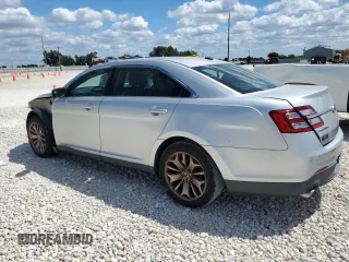 2013 Ford Taurus Limited z VIN 1FAHP2F80DG105499, wystawiony jako Copart lot #70792614 z przebiegiem 106 425 mil mil oraz Czysty tytuł • Clean title. Historia ofert i sprzedaży dostępna na DreamBid. Obrazek 2.
