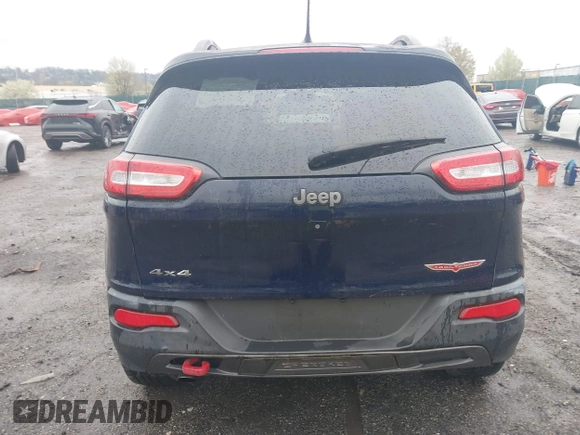 2014 Jeep Cherokee Trailhawk with VIN 1C4PJMBB5EW120432, listed as a IAAI auction lot 41973114 with 88,795 mi miles. Bid and sale history available at carsss.com. Image 16.