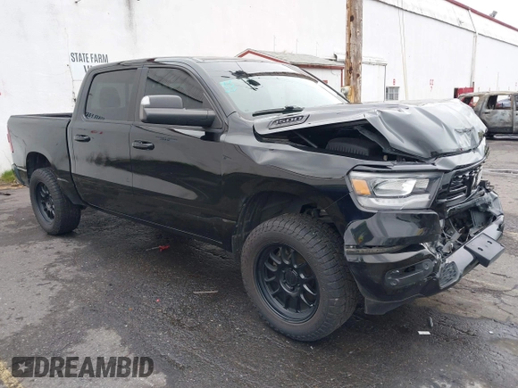 2019 Ram 1500 Big Horn/Lone Star with VIN 1C6SRFFT9KN625013, listed as a IAAI auction lot 41611276 with 100,463 mi miles. Bid and sale history available at carsss.com. Image 1.