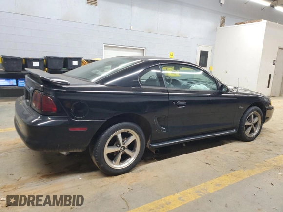1997 Ford Mustang GT with VIN 1FALP42X4VF192088, listed as a Copart auction lot 84714114 with 194,845 mi miles and Salvage title. Bid and sale history available at DreamBid. Image 3.