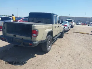 2020 Jeep Gladiator Sport S with VIN 1C6HJTAG1LL173646, listed as a IAAI auction lot 42008807 with Not Provided miles. Bid and sale history available at carsss.com. Image 4.