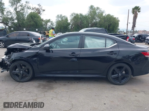 2022 Nissan Sentra SR z VIN 3N1AB8DV3NY295100, wystawiony jako IAAI lot #41901931 z przebiegiem 40 811 mil mil oraz . Historia ofert i sprzedaży dostępna na DreamBid. Obrazek 14.