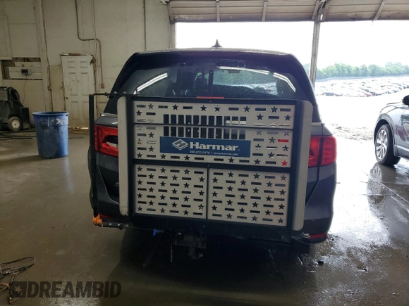 2023 Honda Odyssey Elite with VIN 5FNRL6H98PB056770, listed as a Copart auction lot 56984055 with Not provided miles and Salvage title. Bid and sale history available at DreamBid. Image 6.