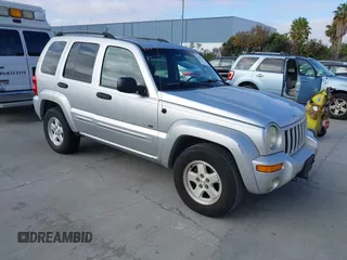 2003 Jeep Liberty Limited z VIN 1J4GK58K13W505617, wystawiony jako IAAI lot #42519292 z przebiegiem 272 992 mil mil oraz . Historia ofert i sprzedaży dostępna na DreamBid. Obrazek 1.
