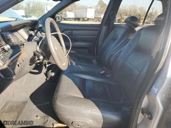 2004 Ford Crown Victoria LX with VIN 2FDFP74W74X150801, listed as a Copart auction lot 43869115 with 138,243 mi miles and Salvage Title. Bid and sale history available at carsss.com. Image 7.
