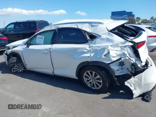 2021 Lexus NX 300 with VIN JTJDARBZ4M5031983, listed as a IAAI auction lot 42260594 with Not provided miles and . Bid and sale history available at DreamBid. Image 14.