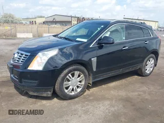 2014 Cadillac SRX Luxury Collection z VIN 3GYFNEE32ES659705, wystawiony jako IAAI lot #42148269 z przebiegiem 140 560 mil mil oraz . Historia ofert i sprzedaży dostępna na DreamBid. Obrazek 2.