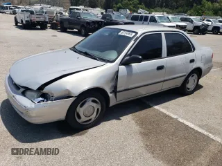 1999 Toyota Corolla VE with VIN 1NXBR12E9XZ221561, listed as a Copart auction lot 60754965 with 153,927 mi miles and Salvage title. Bid and sale history available at DreamBid. Image 1.