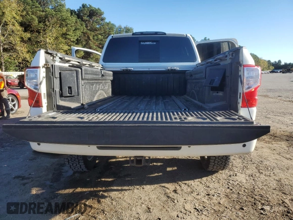 2021 Nissan Titan SV z VIN 1N6AA1FB8MN504530, wystawiony jako Copart lot #80914794 z przebiegiem 103 771 mil mil oraz Szkoda całkowita • Salvage title. Historia ofert i sprzedaży dostępna na DreamBid. Obrazek 6.