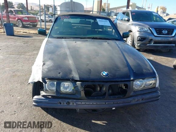 1997 BMW 3-Series 328IC with VIN WBABK8323VET99072, listed as a IAAI auction lot 40669447 with 135,584 mi miles. Bid and sale history available at carsss.com. Image 13.