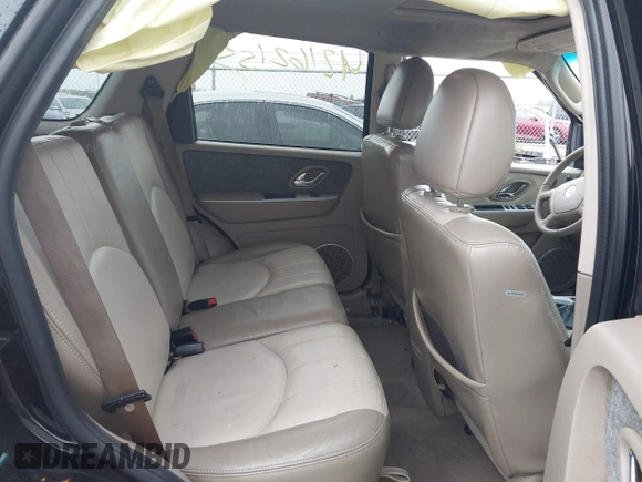 2005 Mercury Mariner Luxury z VIN 4M2CU57115DJ33938, wystawiony jako IAAI lot #42162155 z przebiegiem 174 834 mil mil oraz . Historia ofert i sprzedaży dostępna na DreamBid. Obrazek 8.