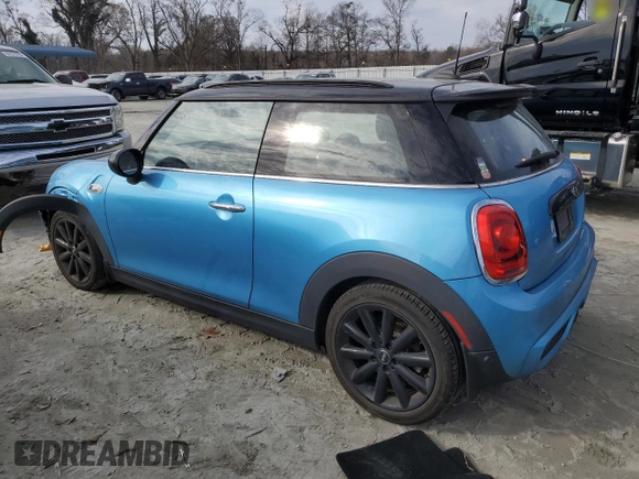 2018 MINI Hardtop Cooper S with VIN WMWXP7C5XJ2A48590, listed as a Copart auction lot 86309584 with 56,643 mi miles and Salvage Title. Bid and sale history available at DreamBid. Image 2.