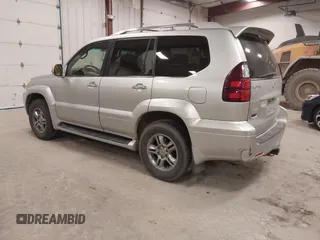 2008 Lexus GX 470 with VIN JTJBT20X480157631, listed as a IAAI auction lot 41965864 with 238,660 mi miles. Bid and sale history available at carsss.com. Image 3.