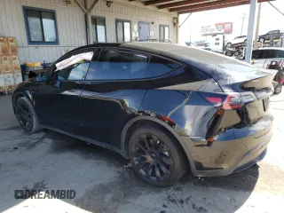 2021 Tesla Model Y Long Range z VIN 5YJYGDEEXMF207223, wystawiony jako Copart lot #48800445 z przebiegiem 44 508 mil mil oraz Szkoda całkowita • Salvage title. Historia ofert i sprzedaży dostępna na DreamBid. Obrazek 2.
