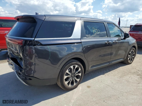 2023 Kia Carnival EX with VIN KNDNC5H31P6241873, listed as a Copart auction lot 46707495 with 33,871 mi miles and Salvage Title. Bid and sale history available at carsss.com. Image 3.