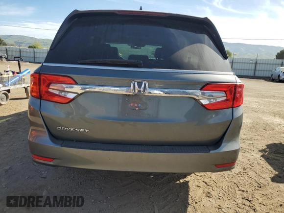 2018 Honda Odyssey EX-L with VIN 5FNRL6H76JB010103, listed as a Copart auction lot 52965965 with 129,837 mi miles and Salvage Title. Bid and sale history available at carsss.com. Image 6.