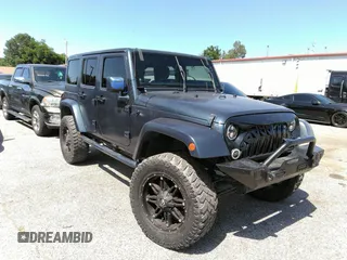 2013 Jeep Wrangler Unlimited Sport z VIN 1C4BJWDG1DL660844, wystawiony jako IAAI lot #42347284 z przebiegiem 168 709 mil mil oraz . Historia ofert i sprzedaży dostępna na DreamBid. Obrazek 1.