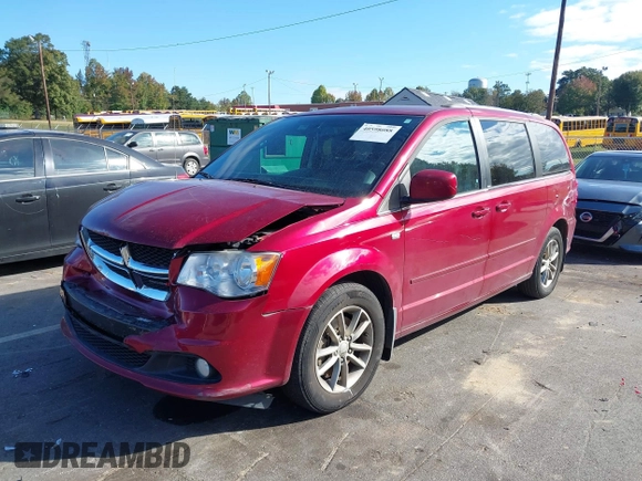 2014 Dodge Grand Caravan SXT with VIN 2C4RDGCG8ER311850, listed as a IAAI auction lot 40598088 with 138,010 mi miles and . Bid and sale history available at DreamBid. Image 2.