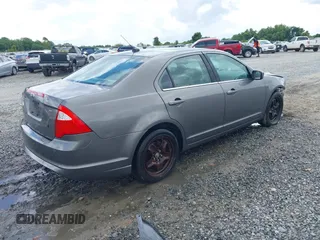 2010 Ford Fusion SE z VIN 3FAHP0HA0AR390424, wystawiony jako IAAI lot #42412805 z przebiegiem 276 002 mil mil oraz . Historia ofert i sprzedaży dostępna na DreamBid. Obrazek 4.